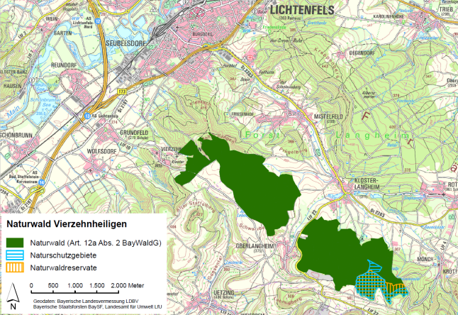 Übersichtskarte des Artenschutzgebiets "Vierzehnheiligen" bei der die Ausweisungen als Naturwaldfläche nach Art. 12 a BayWaldG mit dunkelgrüner Farbe eingezeichnet sind. Naturschutzgebiete sind blau und Naturwaldreservate orange schraffiert. (Geobasisdaten: Bayerische Staatsforsten BaySF, Bayerische Landesvermessung LDBV, Landesamt für Umweld LfU)